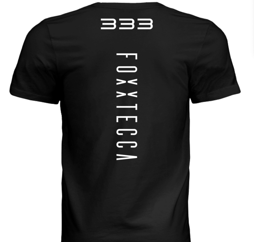 Back view of black t-shirt featuring Foxxtecca logo vertically down the spine with Dystany Spurlock racing number 333 displayed prominently above. Motorsport streetwear apparel.